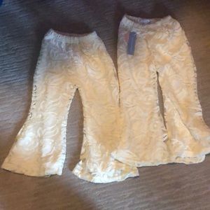 Ivory floral flair pants